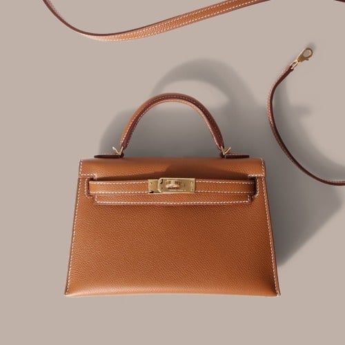 كيلي بني قفل ذهبي