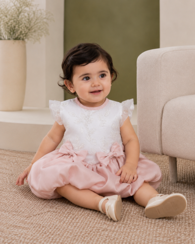 Off-white dress with a royal bow and tail