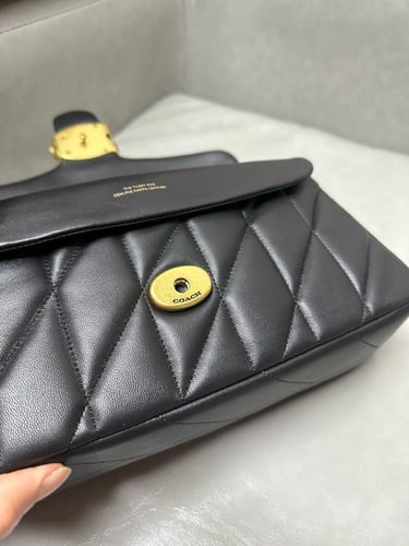 كوتش تابي لوقو ذهبي