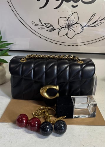 كوتش تابي لوقو ذهبي