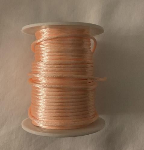 خيط لون خربزي فاتح