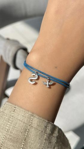 إسوارة باضافه صقر وحرف S فضي/A bracelet with the a...