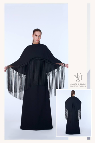 فستان اسود طويل بهدب