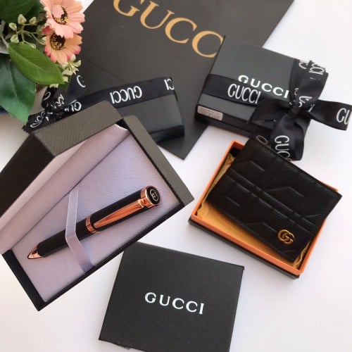 طقم هديه قلم ومحفظه ماركه قوتشي