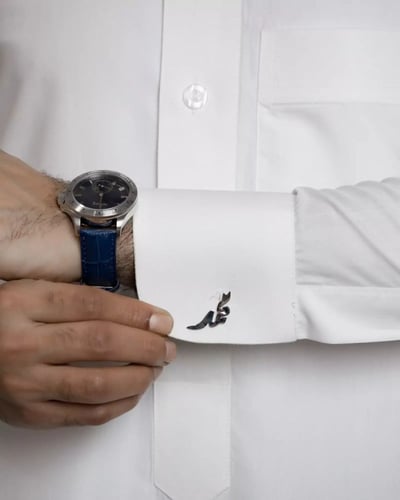 كبكات ثوب رجالي بالاسم