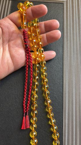 مسباح كهرمان شفاف كريستالي دائري ٥١ خرزه