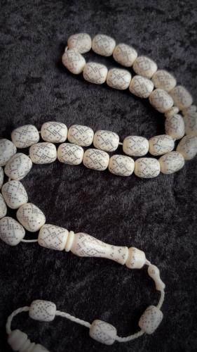 مسباح من العاج الطبيعي المطعم بالفضه