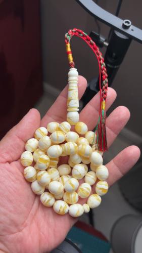 مسباح شبيه الكهرمان القصه ( البيضاويه )