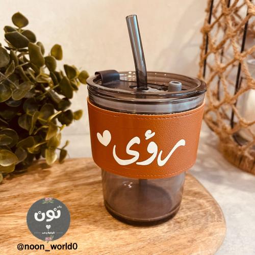كوب زجاج مع مسكة جلد