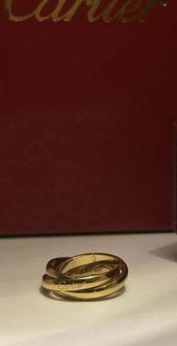 خاتم كارتير ترنتي ذهبي