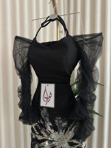 فستان سهره اسود بتطريز وهدب بالاسفل