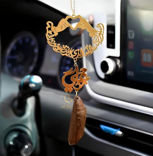 تعليقة سيارة مع كسره العود