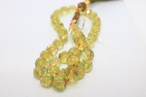 كهرمان بولندي شفاف دائري محجر