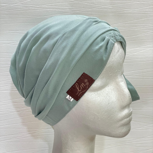 القبعه المبطنه - لون الباستيل الأخضر