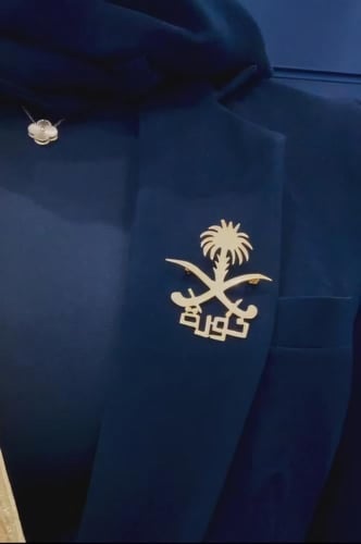 بروش بالاسم مع سيفين ونخلة