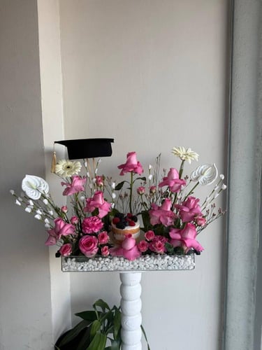 ستاند التخرج مع كيكة التوت