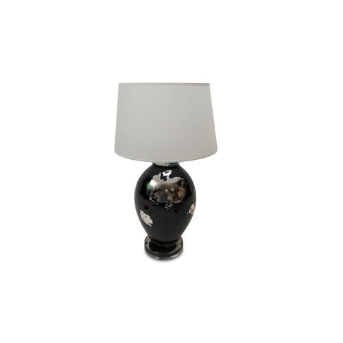 Table lamp with modern Lumière design, a reflective glass base, and an elegant silver touch