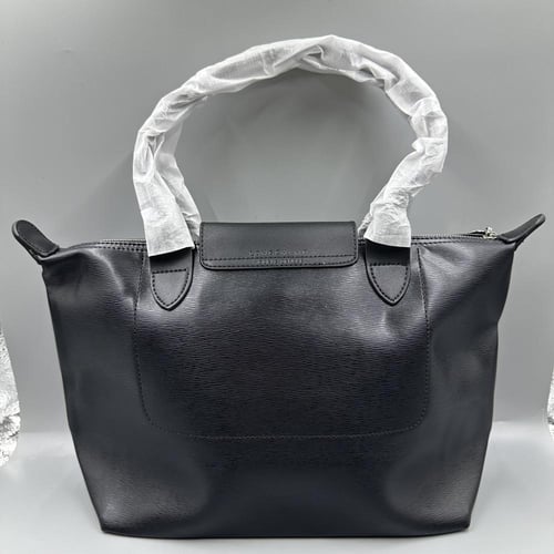 LongChamp - جلد