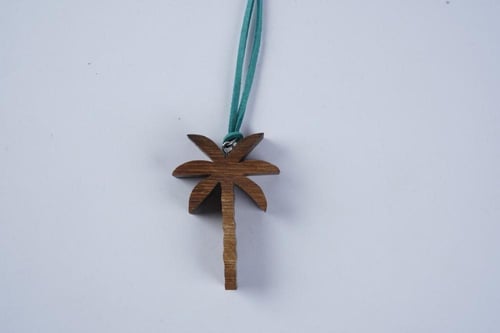 تعليقه السيارة النخلة