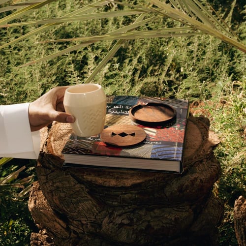 قاعدة أكواب أمجاد