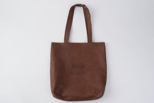 عسير حقيبة جلد - بني