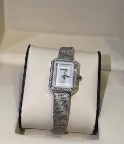 Chanel silver watch with its accessories