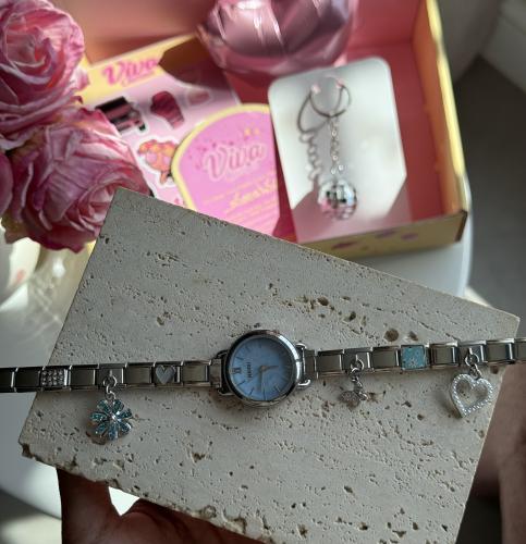 Silver watch with blue accents - 1 -