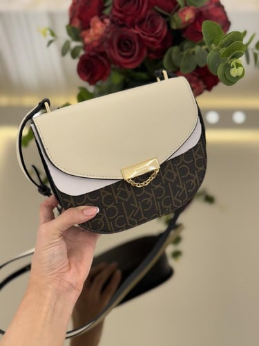 شنطه كيلفن كلابن سقنتشر بني