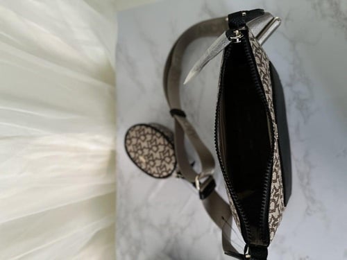 شنطه دكني سقنتشر مع محفظه في الاستراب