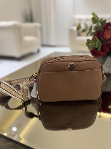 شنطه تومي يوميه لون جملي بفتحتين