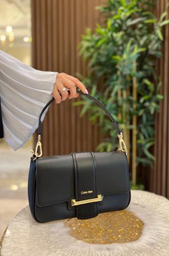 شنطه كيلفن كلاين جلد اسود هاندل قصير + استراب طويل