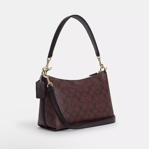 شنطة كوتش بلون مميز و هاندل قصير + ستراب طويل