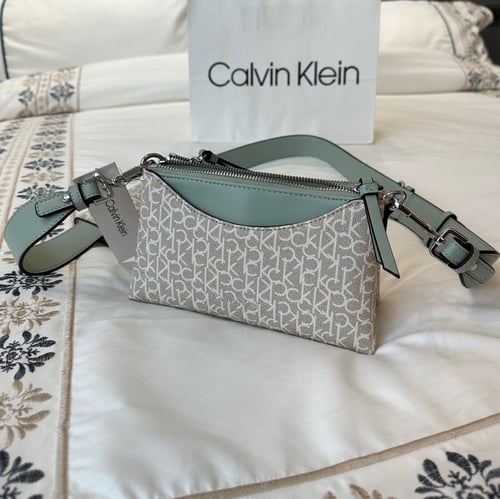 شنطه كيلفن يوميه بستراب ومحفظه