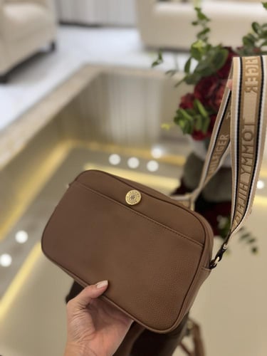 شنطه تومي يوميه لون جملي بفتحتين