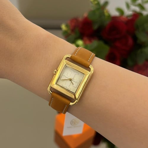 ساعه توري بورش جلد