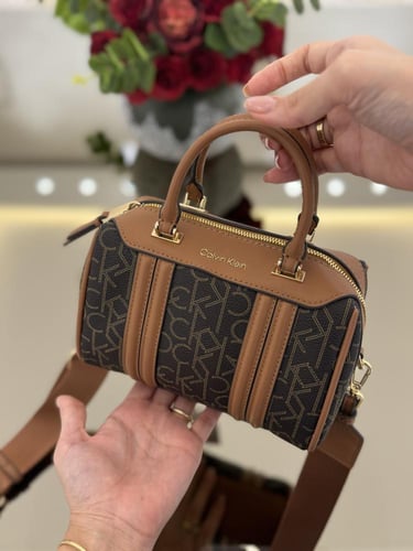 شنطهركيلفن كلاين سقنتشر جملي صغير