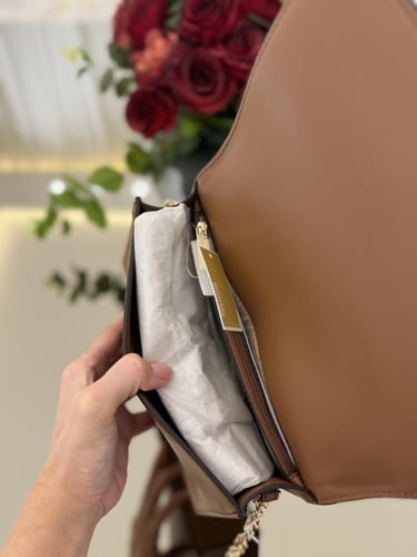 شنطه مايكل كورس كريمي و جملي