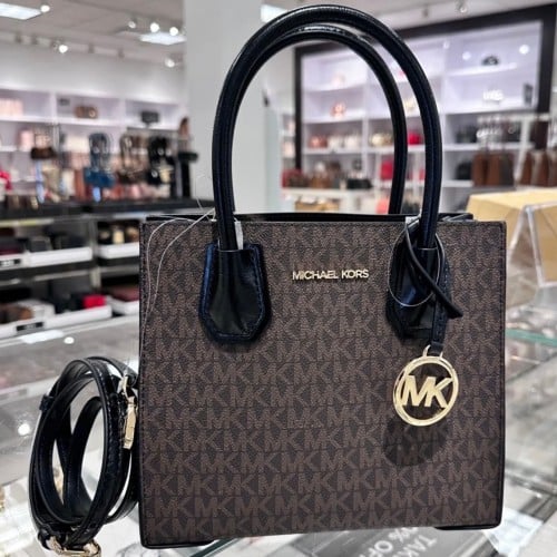 شنطه مايكل كورس سقنتشر بني بدرجين