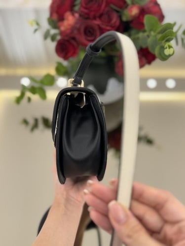 شنطه كيلفن كلابن سقنتشر بني