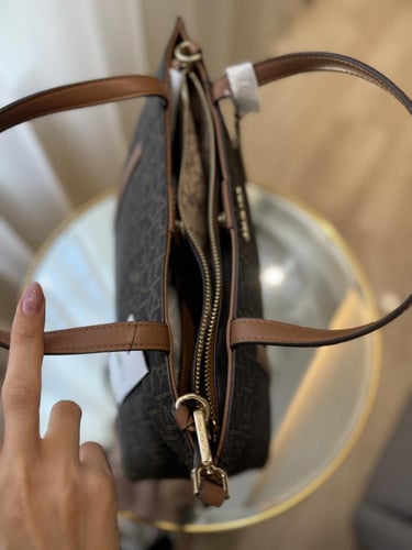 شنطه كيلفن كلاين سقنتشر بني