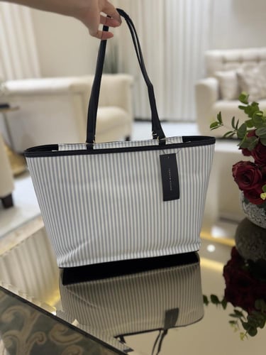 شنطه تومي للدوامات