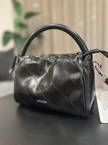 شنطه قيس اسود جلد