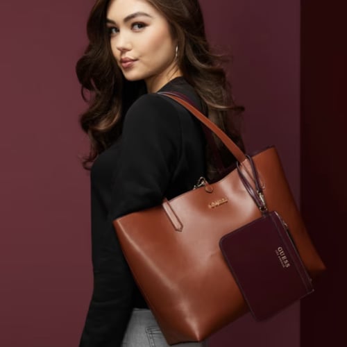 شنطه قيس كبيره للدوامات لون جملي(بدون محفظه)