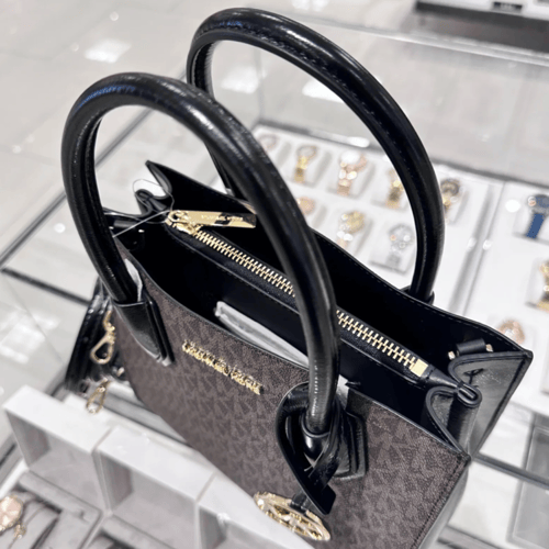 شنطه مايكل كورس سقنتشر بني بدرجين