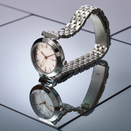 ساعه دكني لون فضي