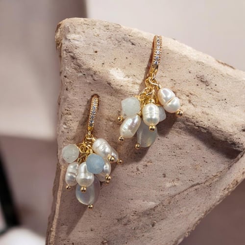 طقم مميز وجميل مطلي من أحجار الاكوامارين الخام الط...