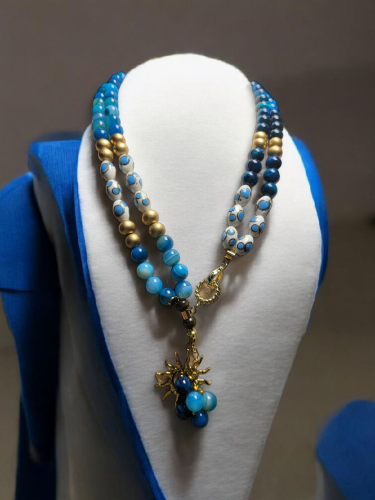 سبحة قلادة ٩٩ حجر من عظم الجمل المنقوش والعقيق الب...