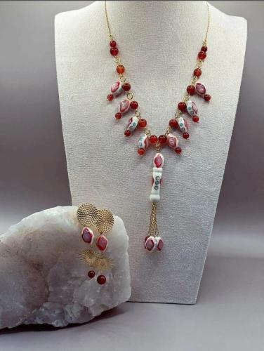 طقم مميز وتراثي من العقيق وخرز من عظم الجمل المنقو...