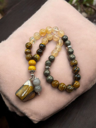 سبحة ٣٣ خرزة من حجر السترين وعين النمر والبيريت وم...