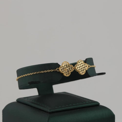 طقم ذهب ورود لماعة - عيار 21